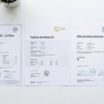 Indian nurse comparing TELC vs Goethe German exam certificates on a study table